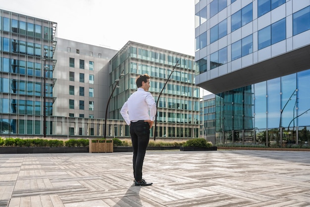 Handsome businessman with elegant suit outdoors portrait