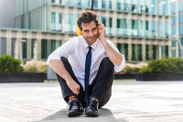 Handsome businessman with elegant suit outdoors portrait