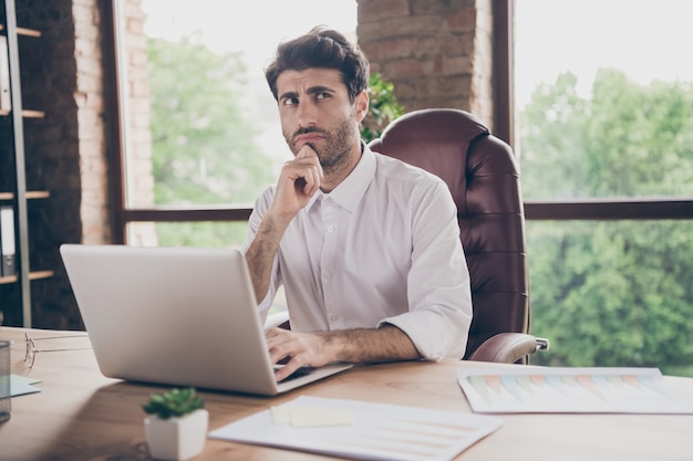 Handsome businessman working at the office