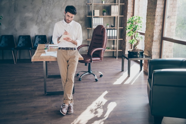 Handsome businessman working at the office