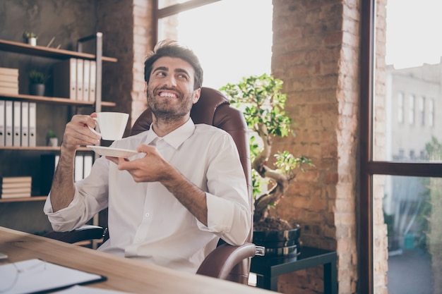 Handsome businessman working at the office