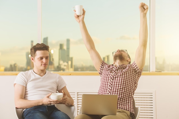 Handsome businessmen celebrating success