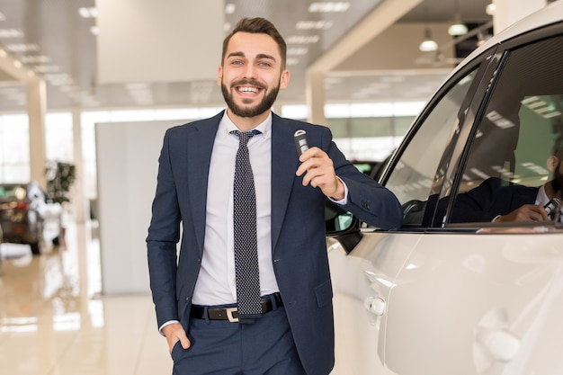 Handsome Car Salesman Holding Keys