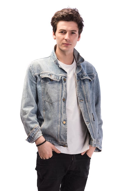 Handsome casual young man in jeans jacket on a white background