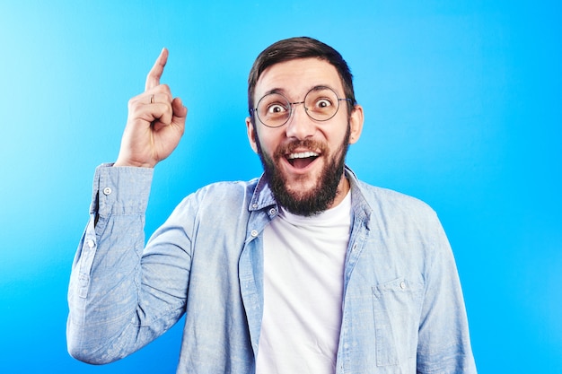 Handsome caucasian guy with delighted enthusiastic face open mouth