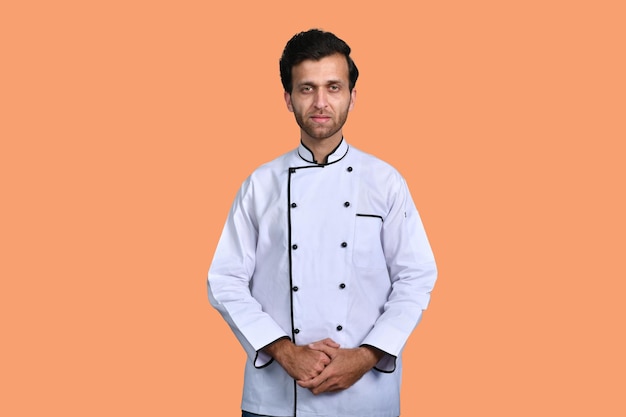 handsome chef cook front pose white outfit indian pakistani model