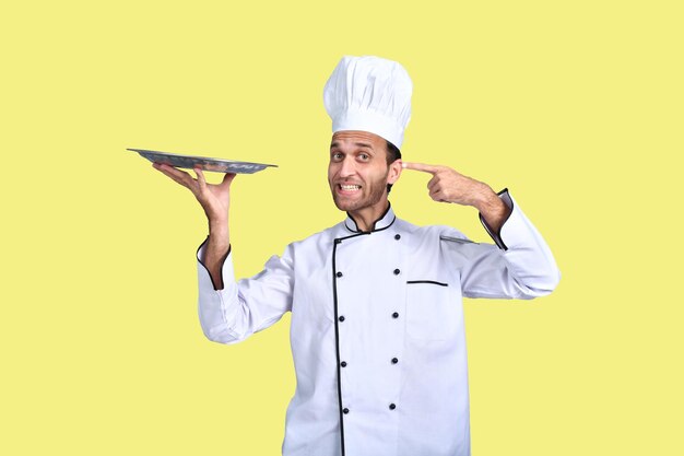 handsome chef cook white outfit holding plate indian pakistani model