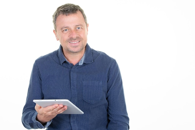 Handsome concentrated man with digital tablet computer screen