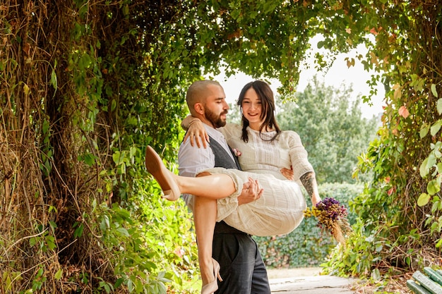 Handsome couple girl and guy in the park