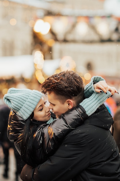 Handsome couple having fun on winter holidays