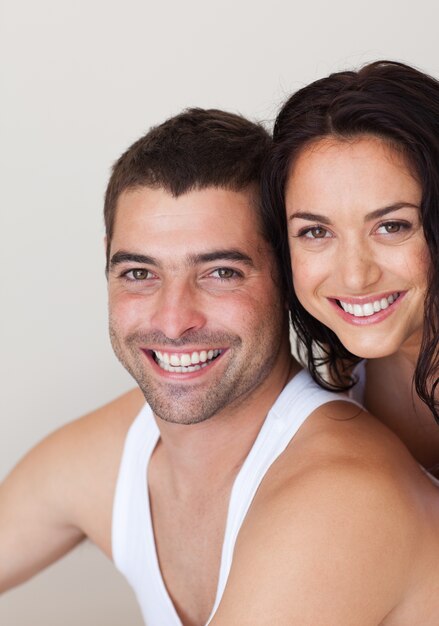 Handsome couple smiling at camera