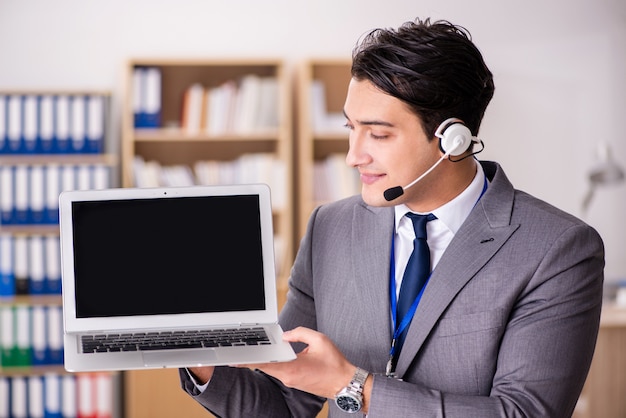 Handsome customer service clerk with headset 