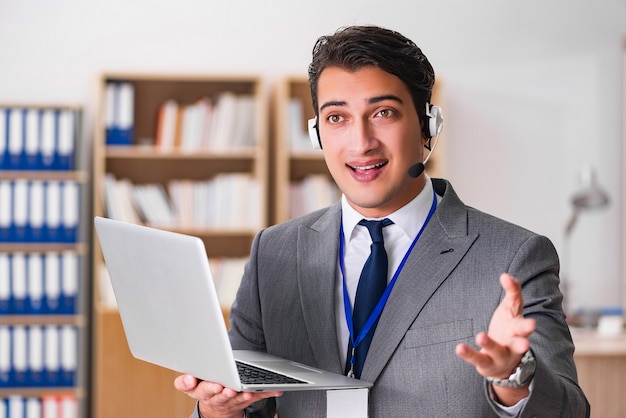 Handsome customer service clerk with headset 