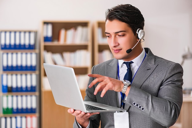 Handsome customer service clerk with headset 