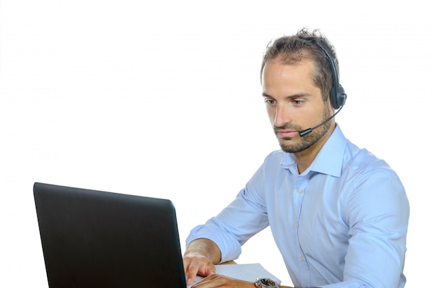 Handsome customer service operator wearing a headset