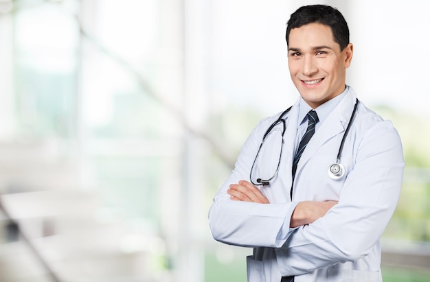 Handsome doctor portrait  on background