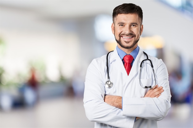 Handsome doctor portrait  on background