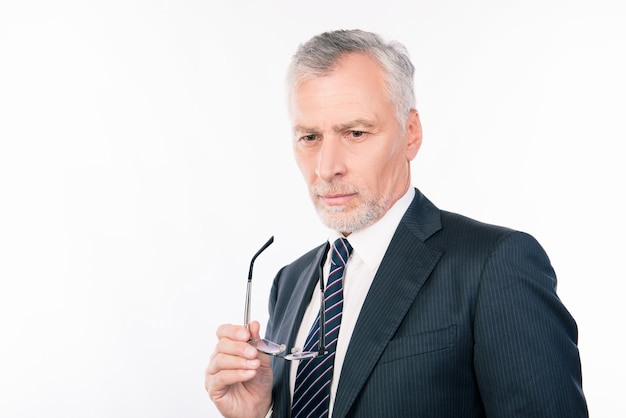 Handsome elderly businessman in a suit