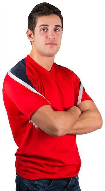 Photo handsome football fan in red jersey