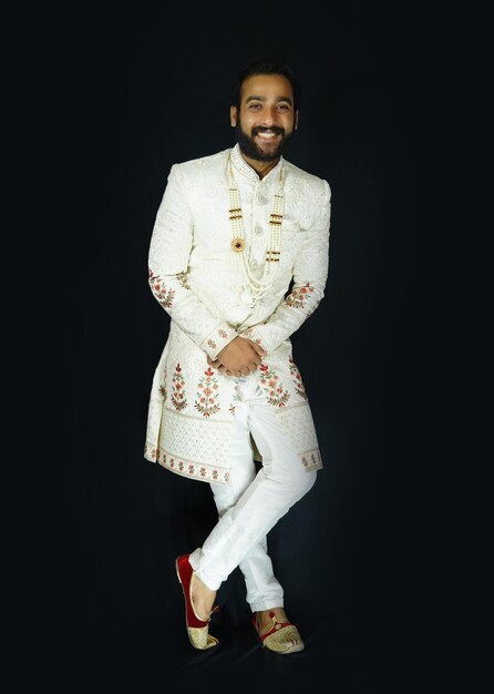 handsome groom smiling face image on black background