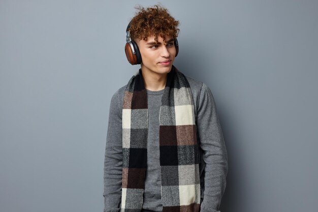 Handsome guy fashion posing headphones lifestyle unaltered