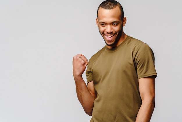 Handsome guy over light gray background