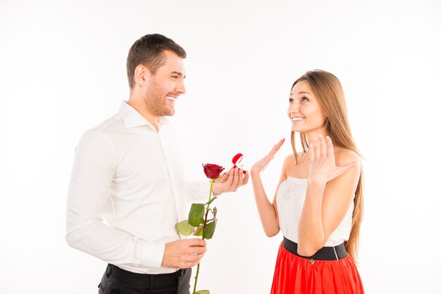 Handsome guy proposing to his girlfriend