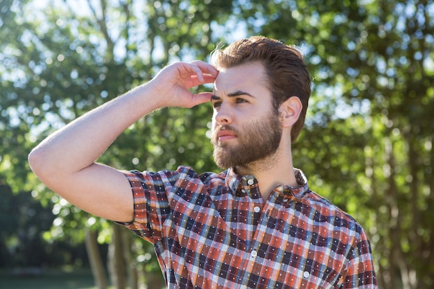 Handsome hipster looking to the distance