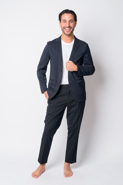 handsome Hispanic businessman wearing suit