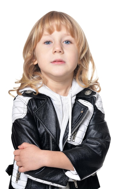 Handsome little boy posing against white background