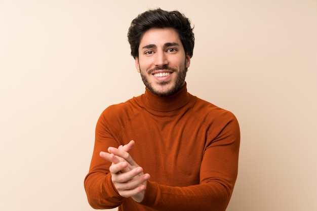 Handsome man applauding