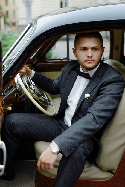 Handsome man in the car