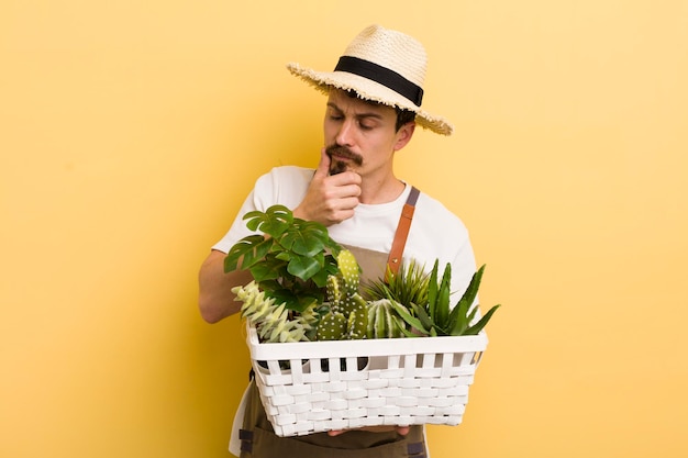 Handsome man gardering with plants