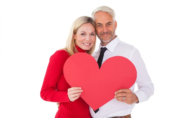 Handsome man getting a heart card form wife on white background