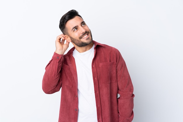 Handsome man over isolated blue