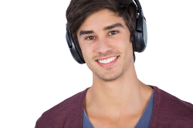 Handsome man listening music