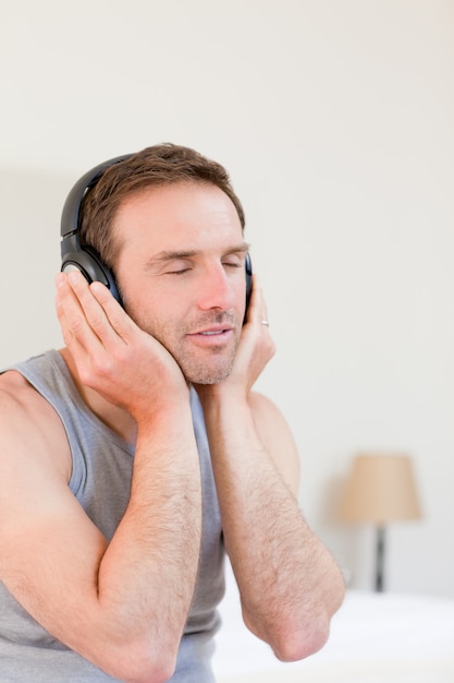 Handsome man listening to some music