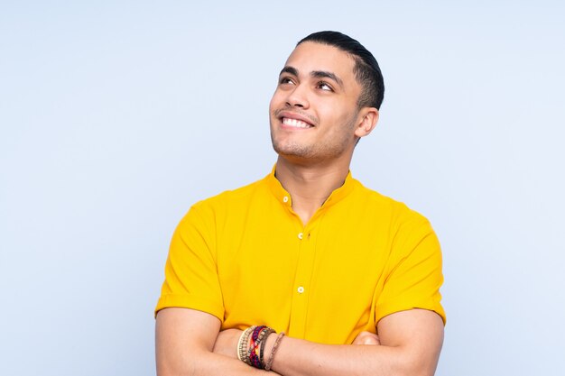 handsome man over looking up while smiling