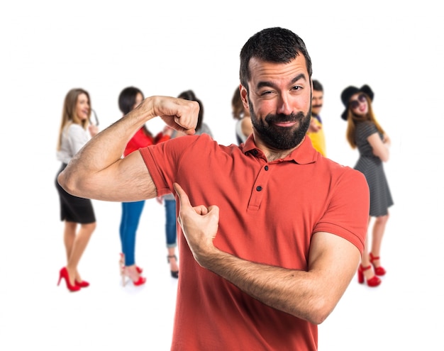 Handsome man making strong gesture