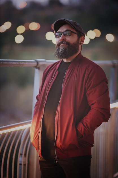 Handsome man portrait against night urban