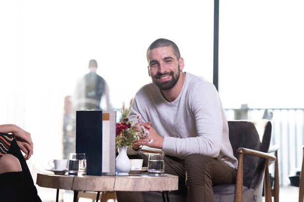 Handsome Man in a Restaurant