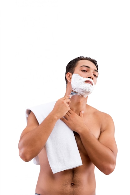 Handsome man shaving isolated on white background