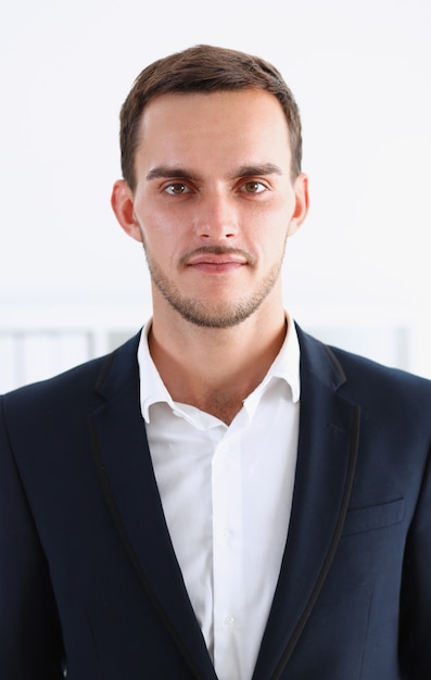 Handsome man in suit and tie look in camera