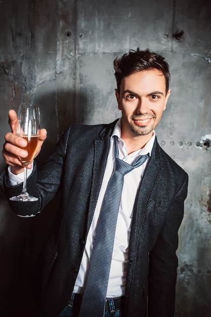 Handsome man toasting on xmas party