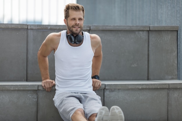 Handsome man training and working out outdoors