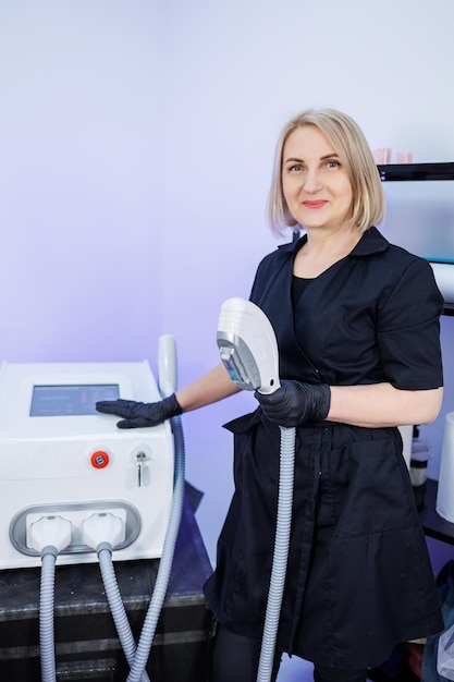 A handsome man undergoing a laser hair removal procedure Laser epilation of the male body Body hygiene