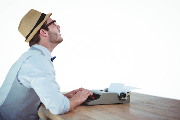 Photo handsome man using old fashioned typewriter