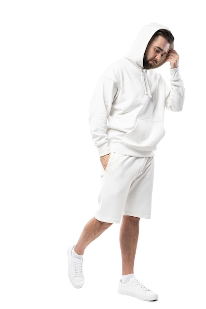 Handsome man wearing blank white hoodie and shorts isolated on white background