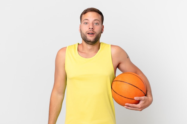 Handsome man with a basketball ball