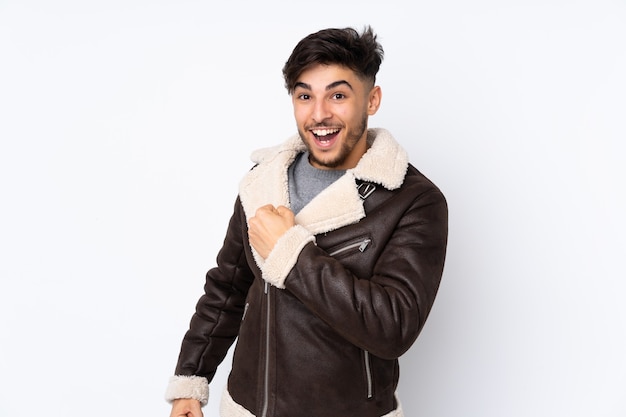 Handsome man with a jacket in studio